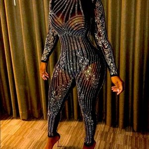 Black rhinestone catsuit.  Excellent for a New Year party